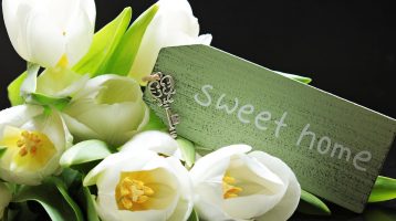 sweet home with keys and white tulips